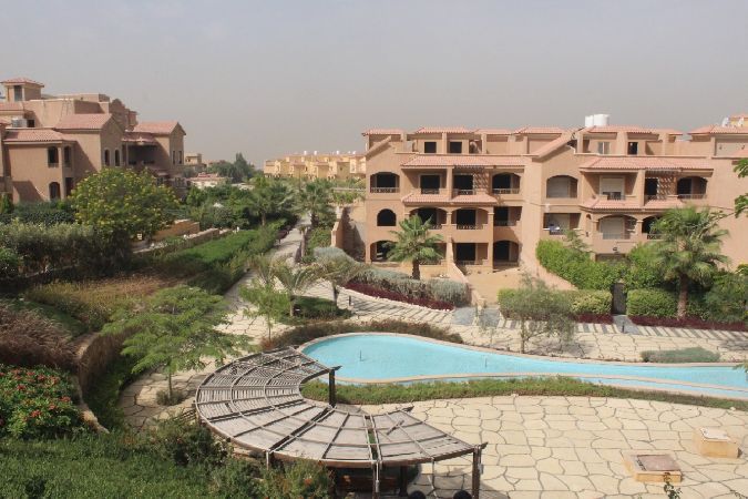 Townhouse for sale at Leena Spring , New Cairo garden view .